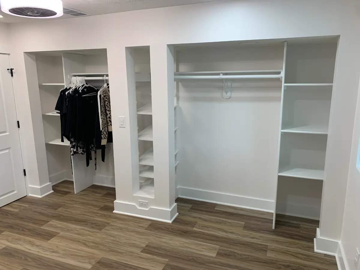 basement renovation with built-in closets and vanity, after