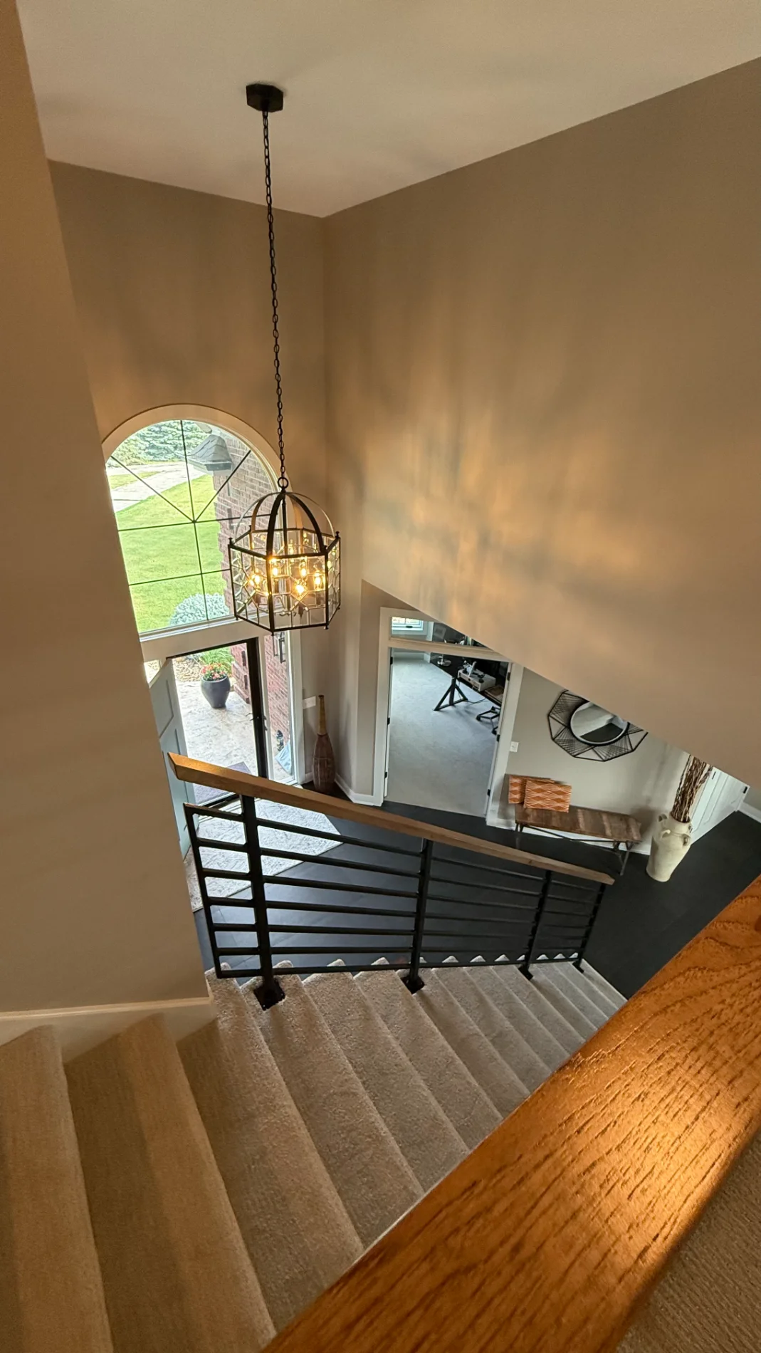 Kitchen with recessed lighting and a statement pendant fixture over the island