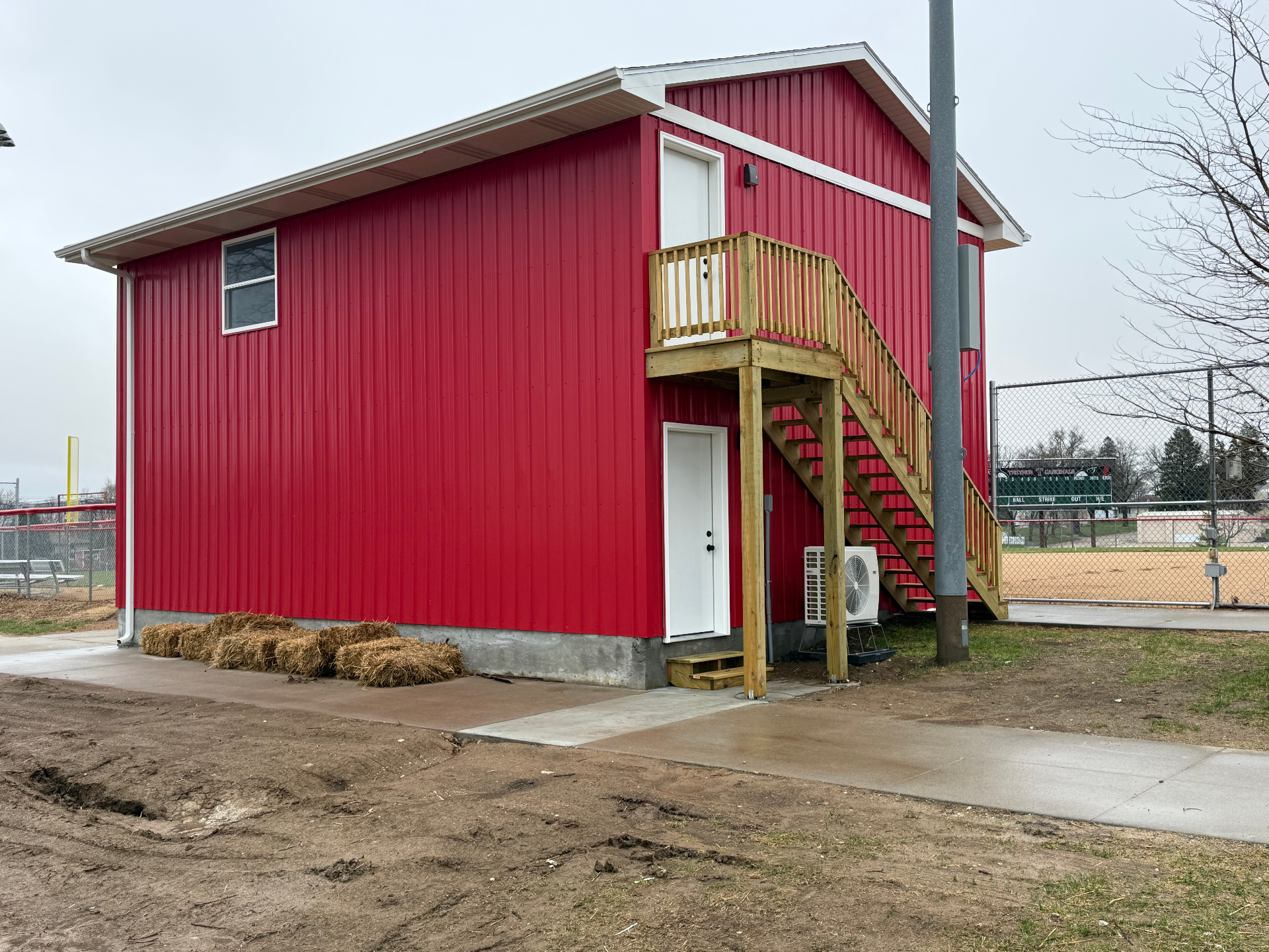 Softball field box exterior built by Verespej Construction, after