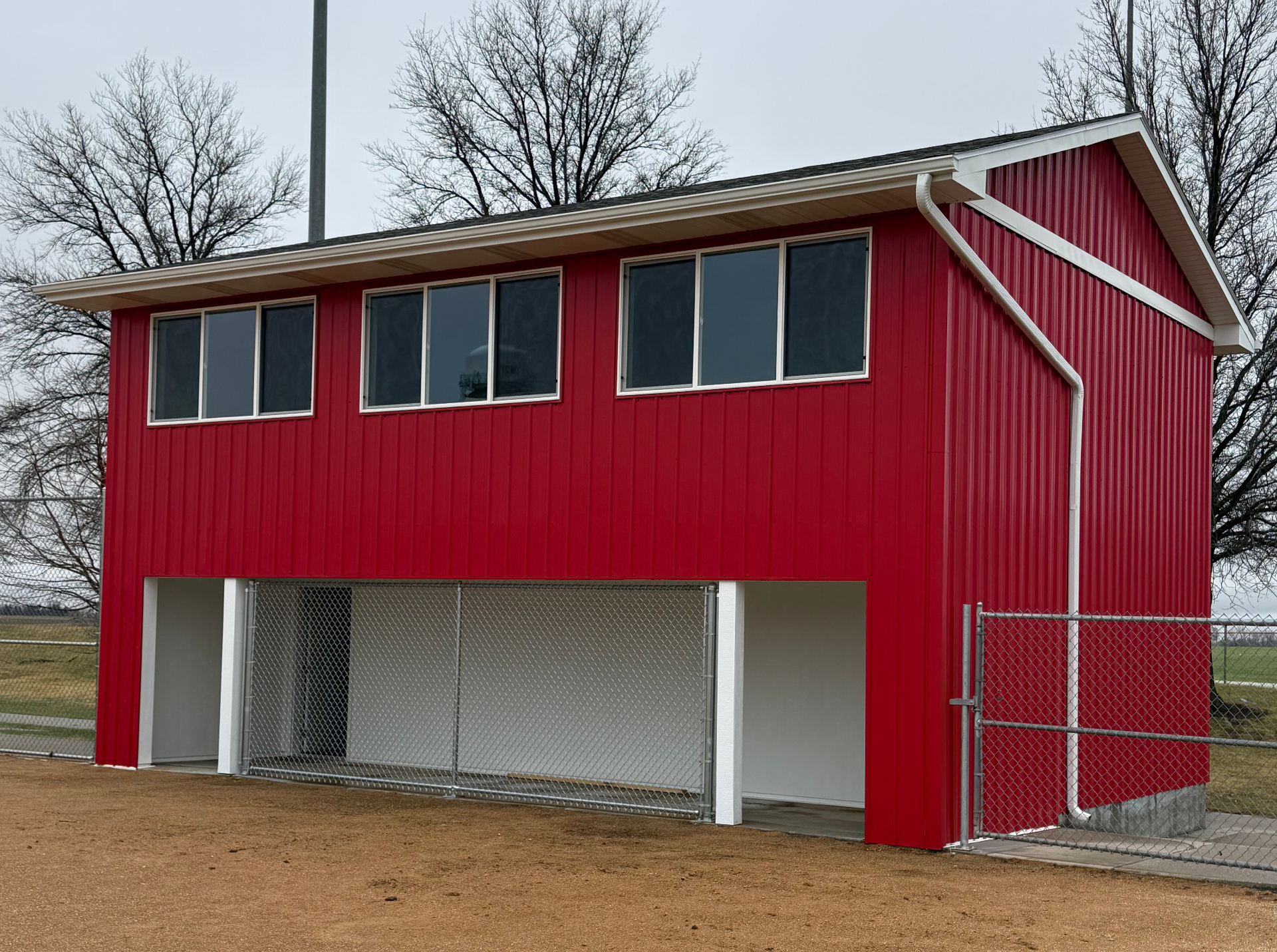 Softball field box exterior built by Verespej Construction, after